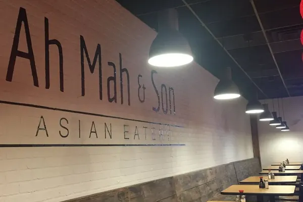 Ah Mah and Son Asian Eatery sign and dining area in Crossville