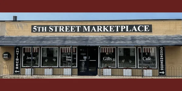 The 5th Street Marketplace storefront with gift shop and café windows