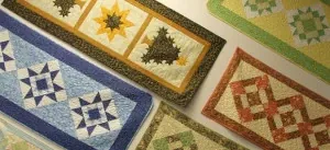 Colorful quilts displayed by Little Blessings Quilt Shop