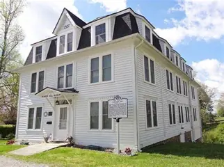 The white historic Pioneer Hall Museum building